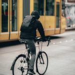 man-in-black-jacket-riding-a-bicycle-3941305